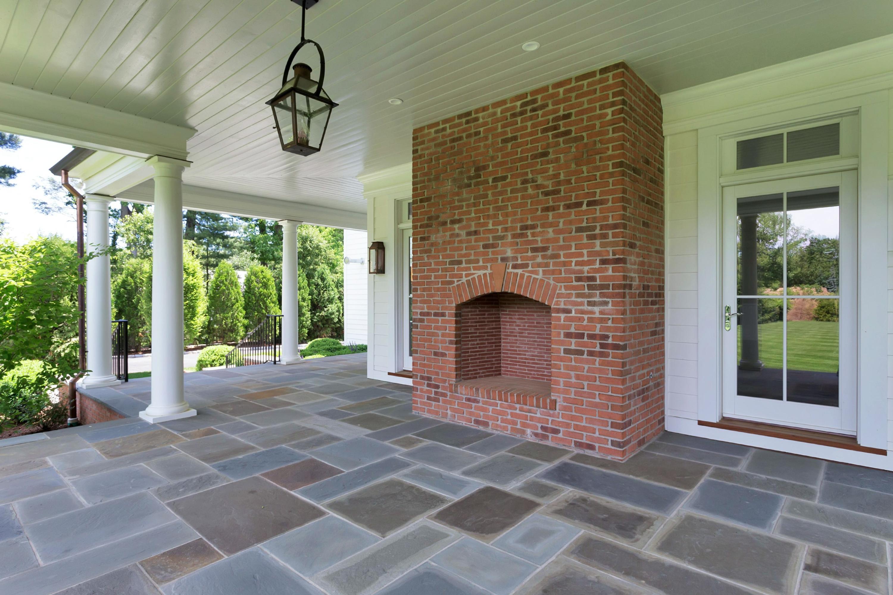 6 A Cross Road Darien, CT 06820 - Photo 21 of 24 a view of empty room with windows and fireplace