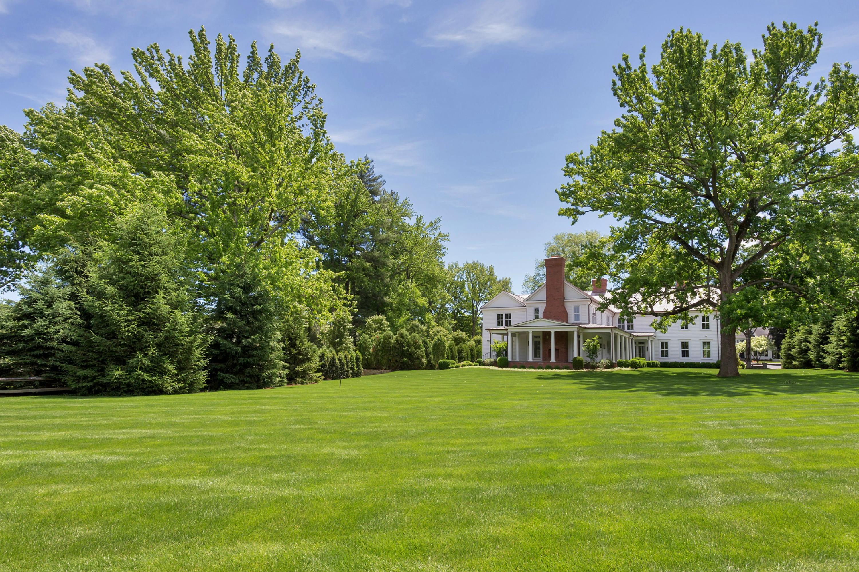6 A Cross Road Darien, CT 06820 - Photo 24 of 24 a view of a house with a big yard