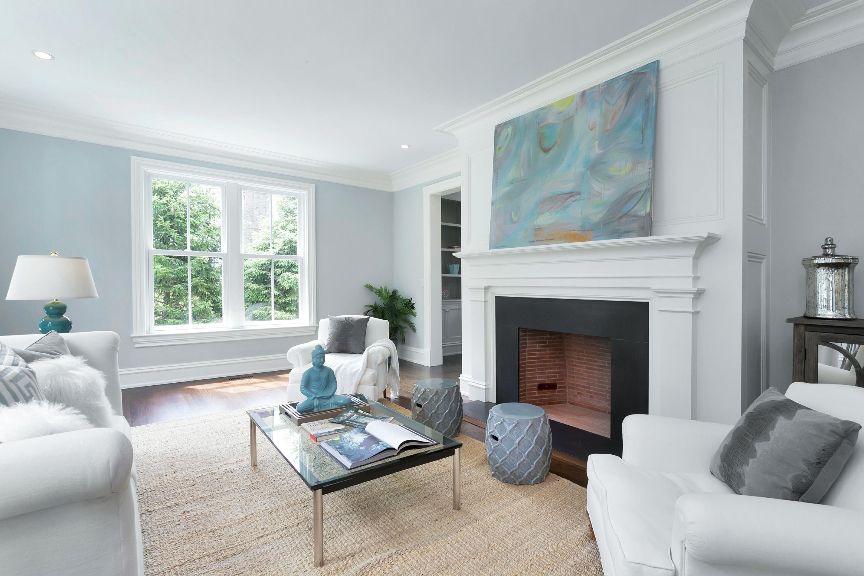 6 A Cross Road Darien, CT 06820 - Photo 6 of 24 a living room with furniture and a fireplace