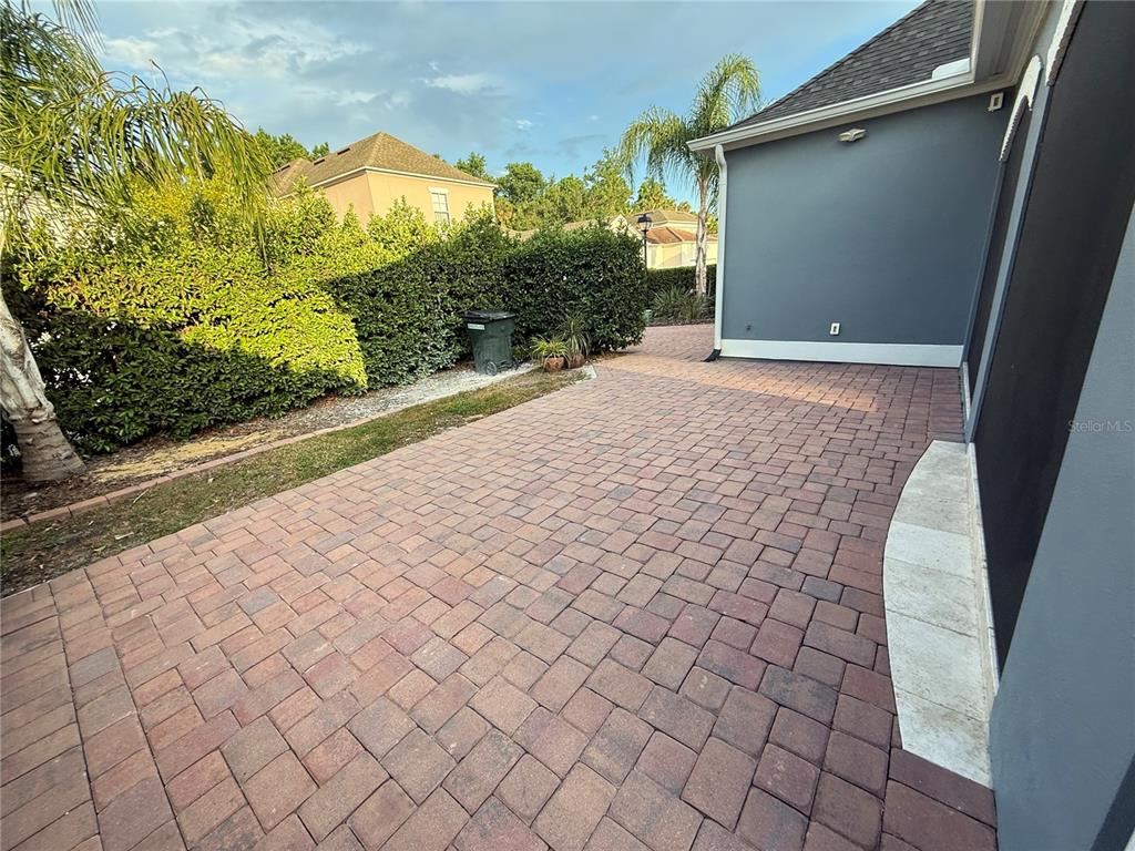 1115 Damask Street Celebration, FL 34747 - Photo 11 of 17 a view of a pathway both side of house