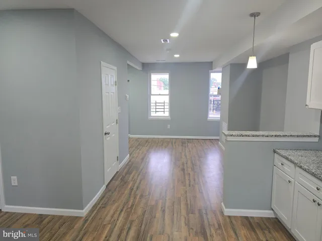 a view of livingroom with hardwood floor and window