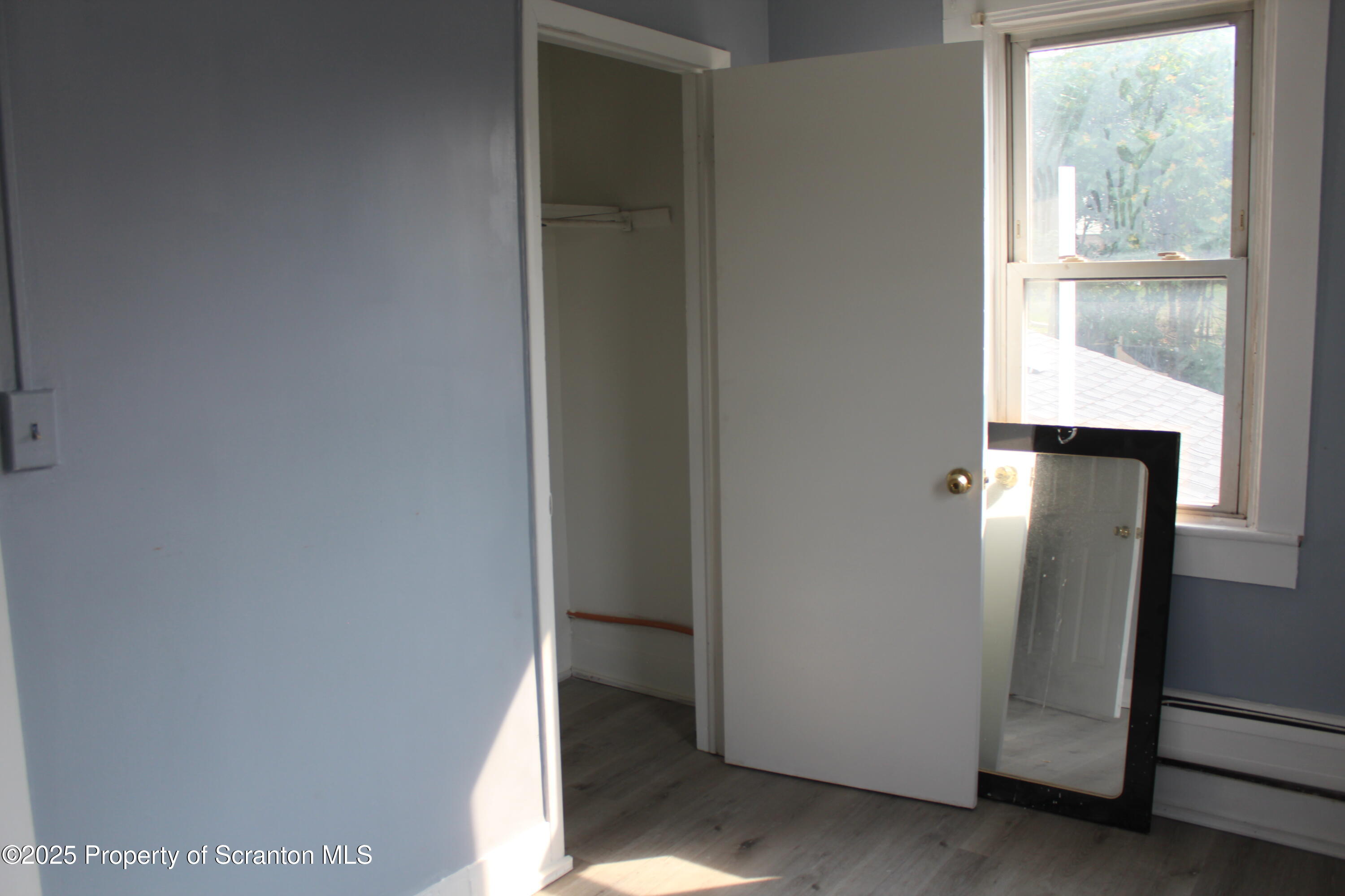 1507 Luzerne Street Scranton, PA 18504 - Photo 19 of 26 a view of an empty room with a window