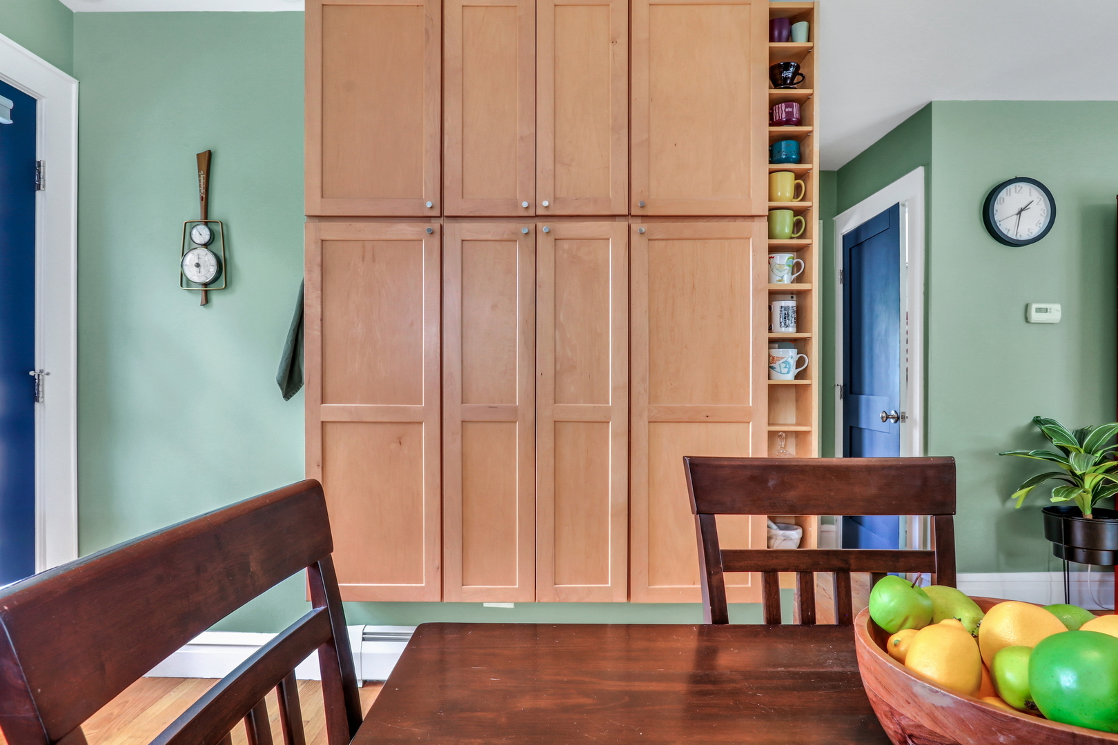732 Rogers Road Gurnee, IL 60031 - Photo 16 of 44 a view of a dining room with furniture and wooden floor