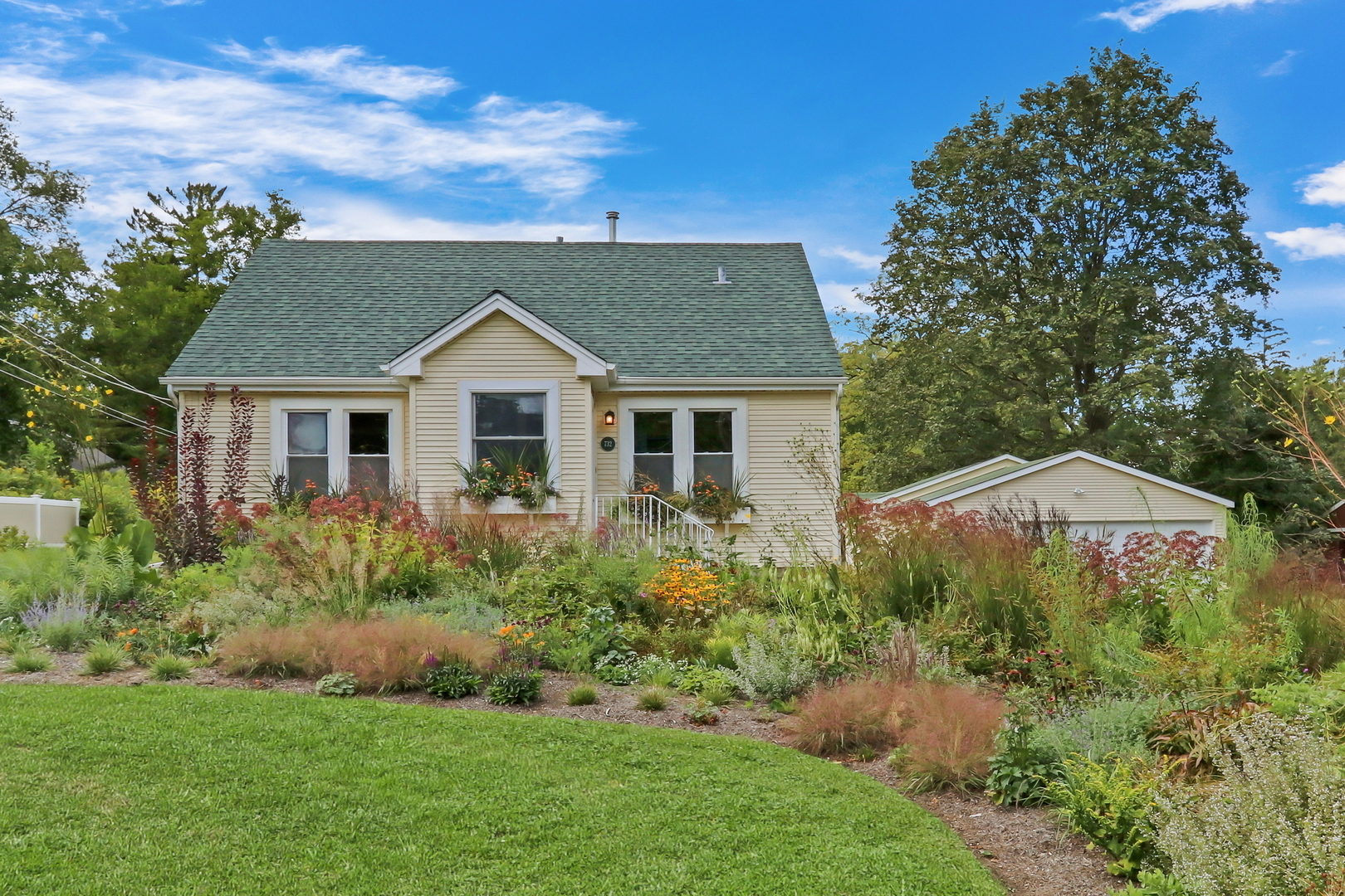 732 Rogers Road Gurnee, IL 60031 - Photo 2 of 44 a front view of a house with a yard