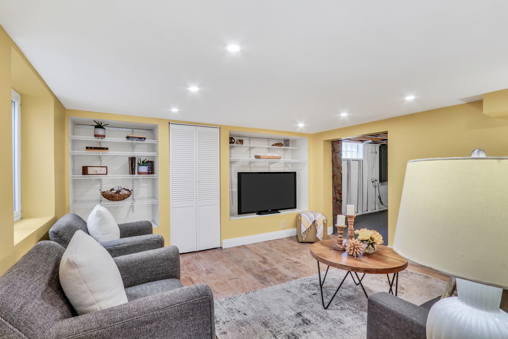 732 Rogers Road Gurnee, IL 60031 - Photo 24 of 44 a living room with furniture and a flat screen tv