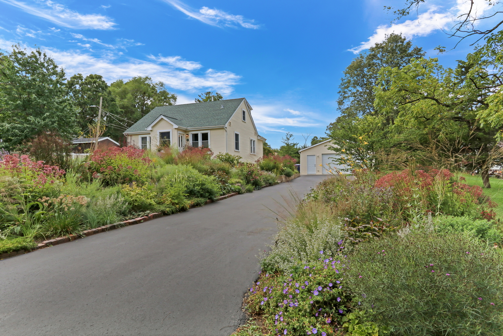 732 Rogers Road Gurnee, IL 60031 - Photo 33 of 44 a view of a garden with a house