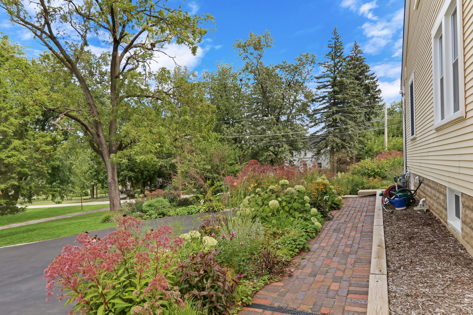 732 Rogers Road Gurnee, IL 60031 - Photo 36 of 44 a view of a garden with pathway