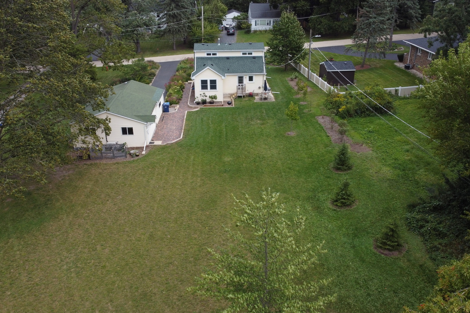 732 Rogers Road Gurnee, IL 60031 - Photo 39 of 44 an aerial view of residential houses with outdoor space and trees