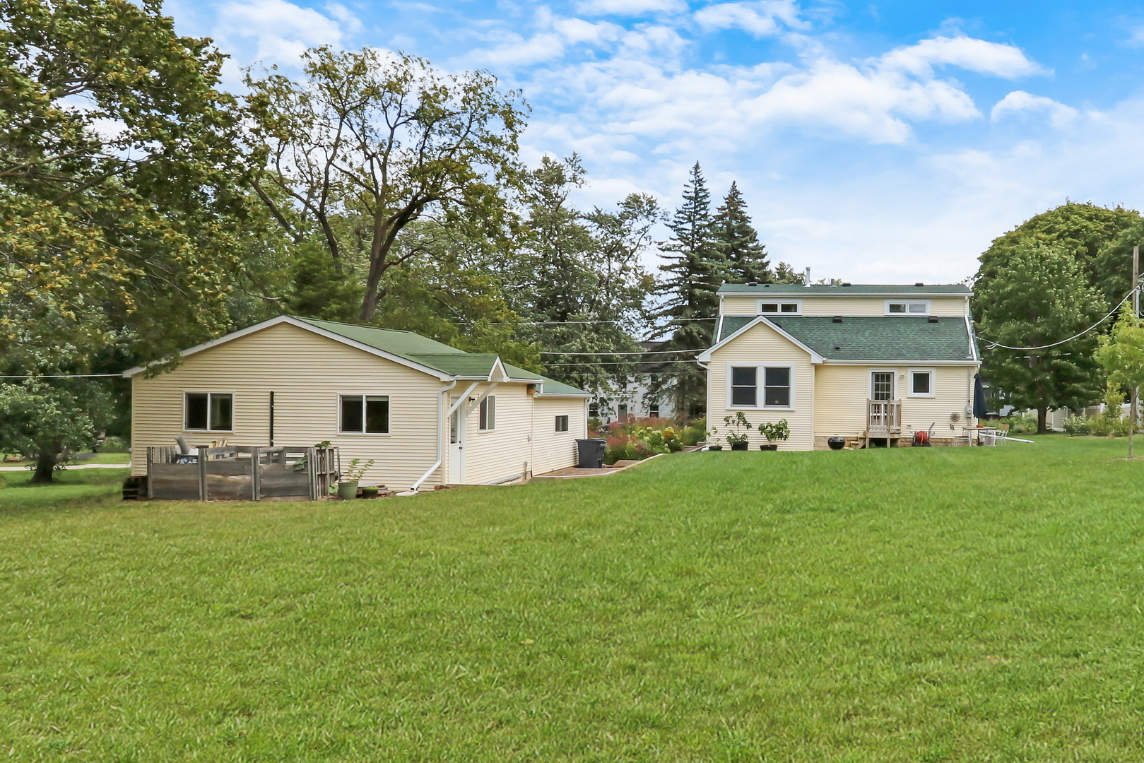 732 Rogers Road Gurnee, IL 60031 - Photo 4 of 44 a front view of a house with a yard and trees