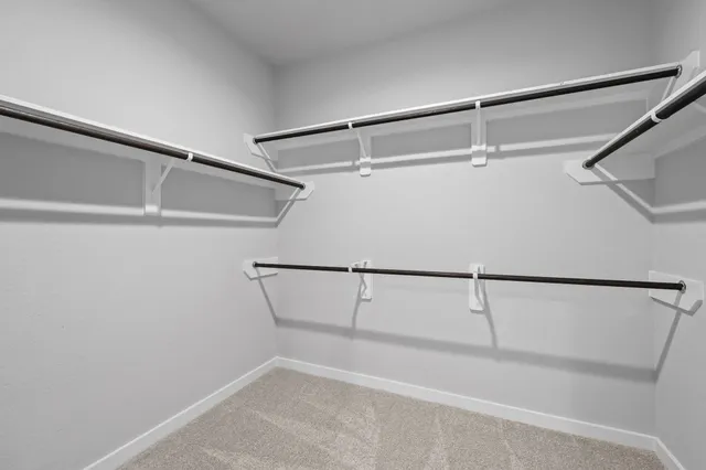 a view of a room with racks on the wall