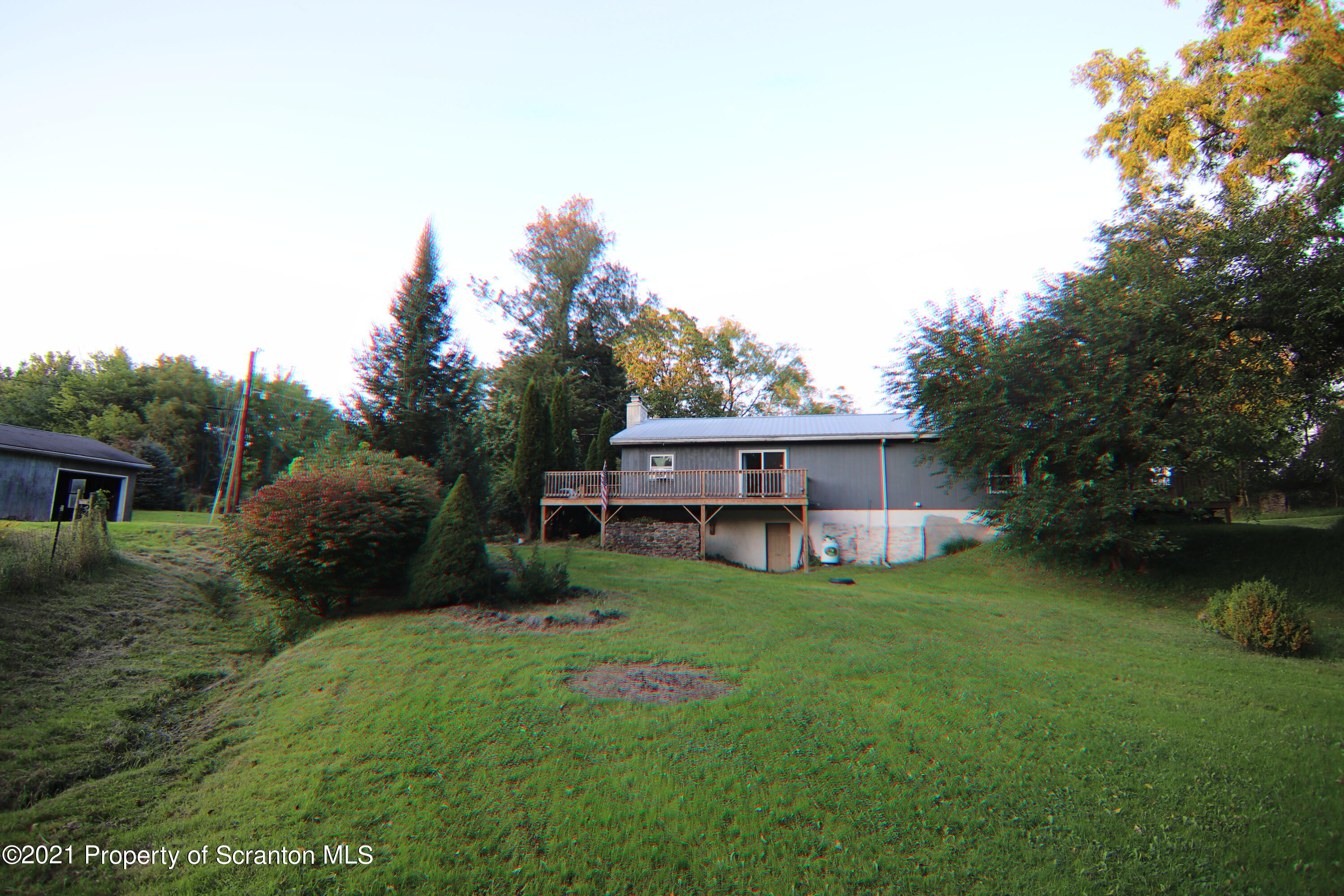 139 Rabbitt Hollow Road Meshoppen, PA 18630 - Photo 54 of 55 a view of a house with a yard and sitting area