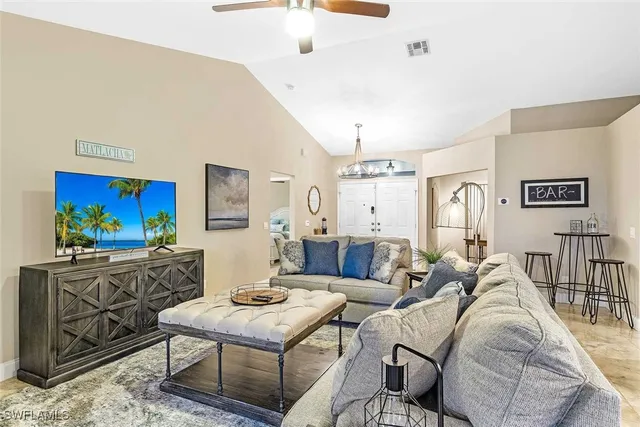 a view of a livingroom with furniture and a couch
