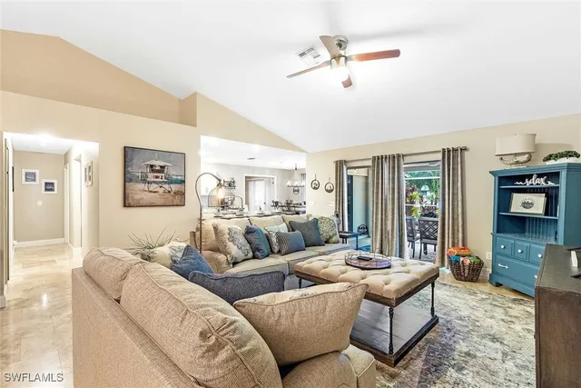 a large kitchen with stainless steel appliances granite countertop a stove and a sink