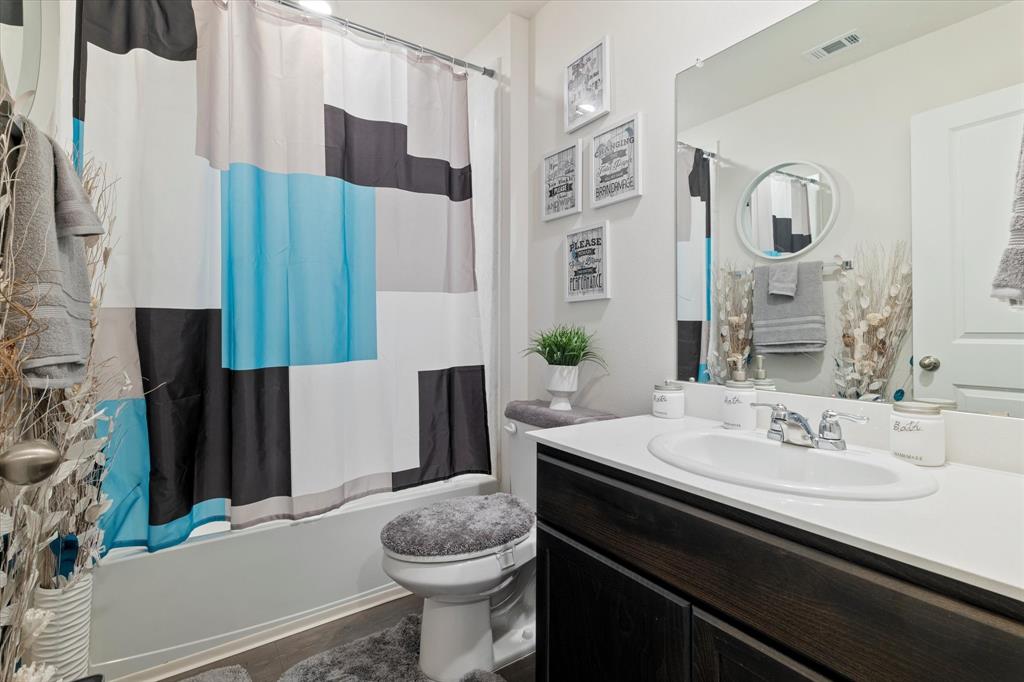 113 Clason Road Royse City, TX 75189 - Photo 15 of 25 a bathroom with a sink a toilet and shower