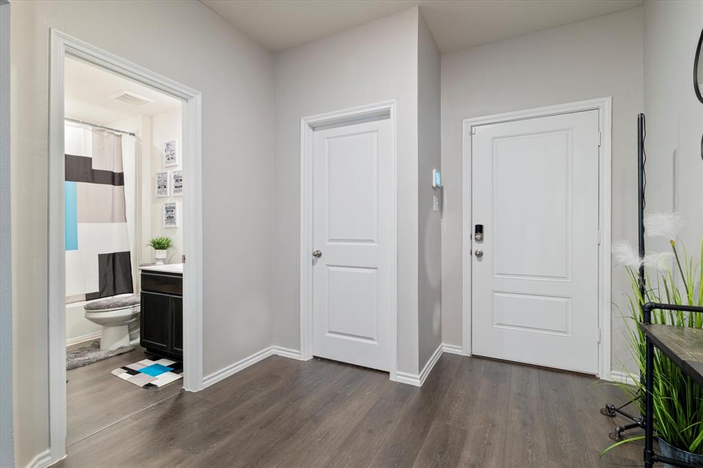 113 Clason Road Royse City, TX 75189 - Photo 20 of 25 an empty room with wooden floor and windows