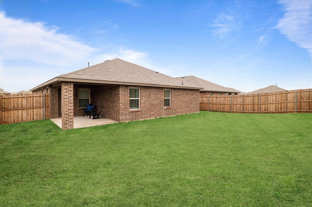 113 Clason Road Royse City, TX 75189 - Photo 25 of 25 a front view of a house with backyard