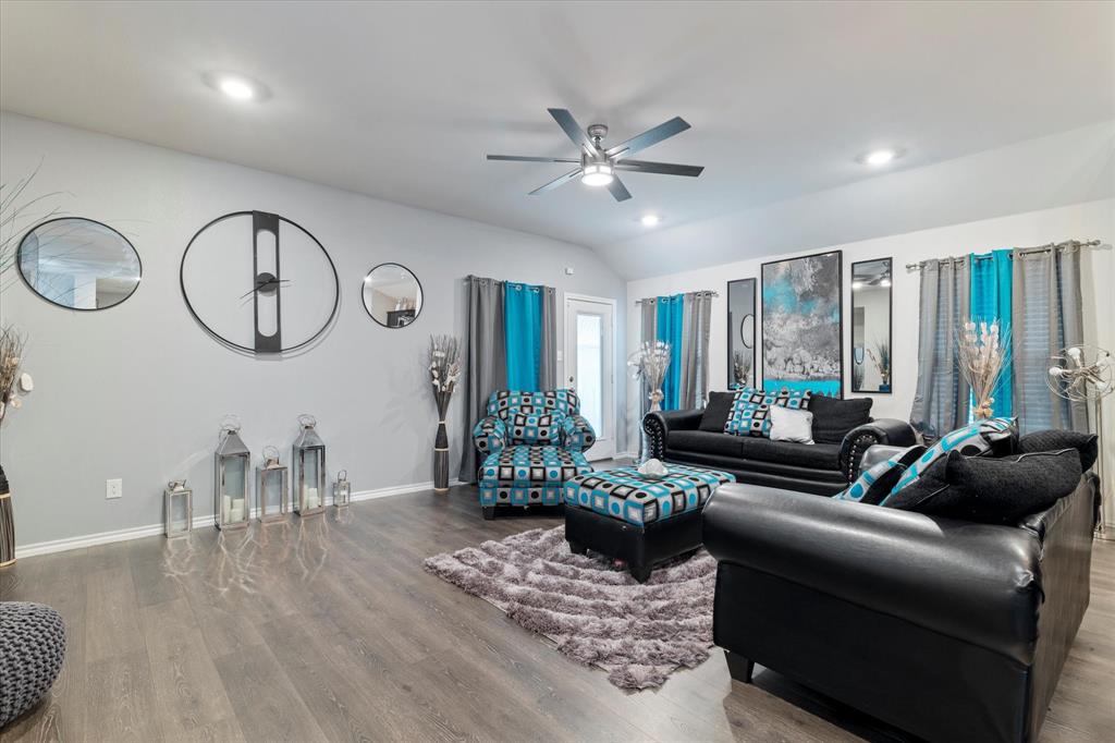113 Clason Road Royse City, TX 75189 - Photo 7 of 25 a living room with furniture and a large window