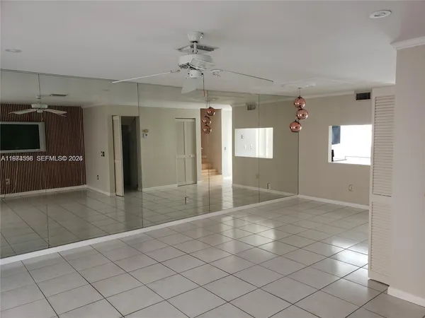 a bedroom with a bed and a table in it