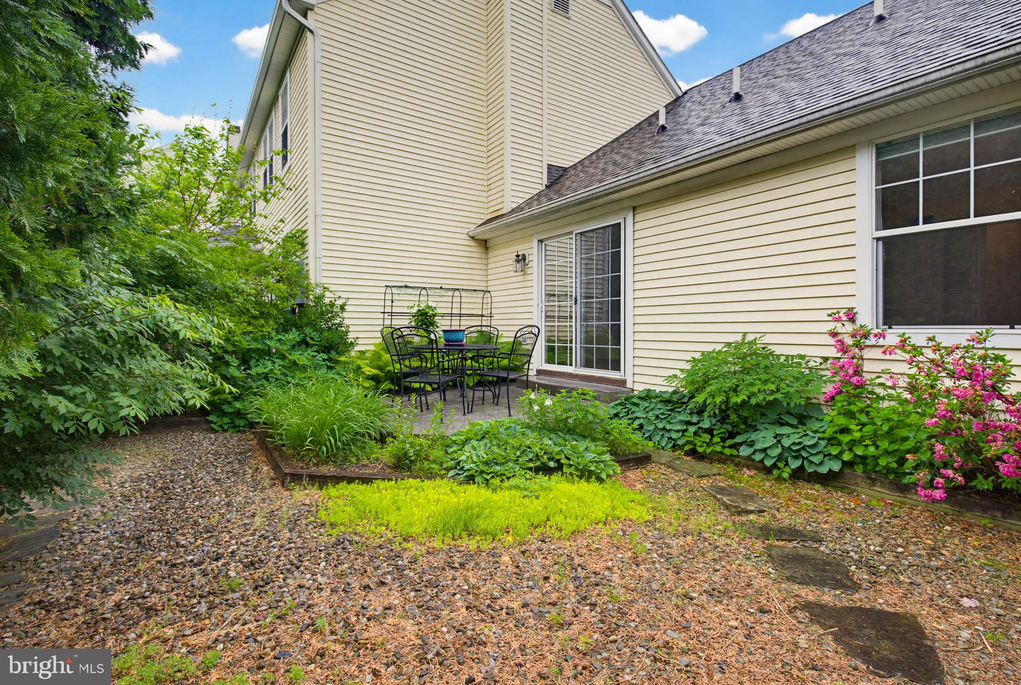 1037 Kent Garden Lititz, PA 17543 - Photo 9 of 31 a view of a house with a yard and potted plants