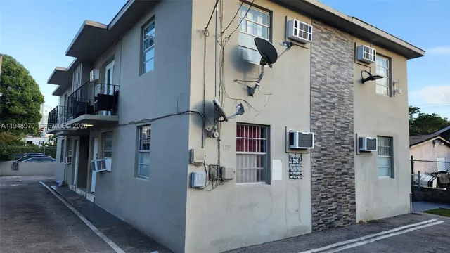 a view of a house with a street
