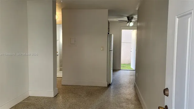 an empty room with a bathroom