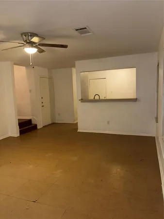 a view of a room with an empty space