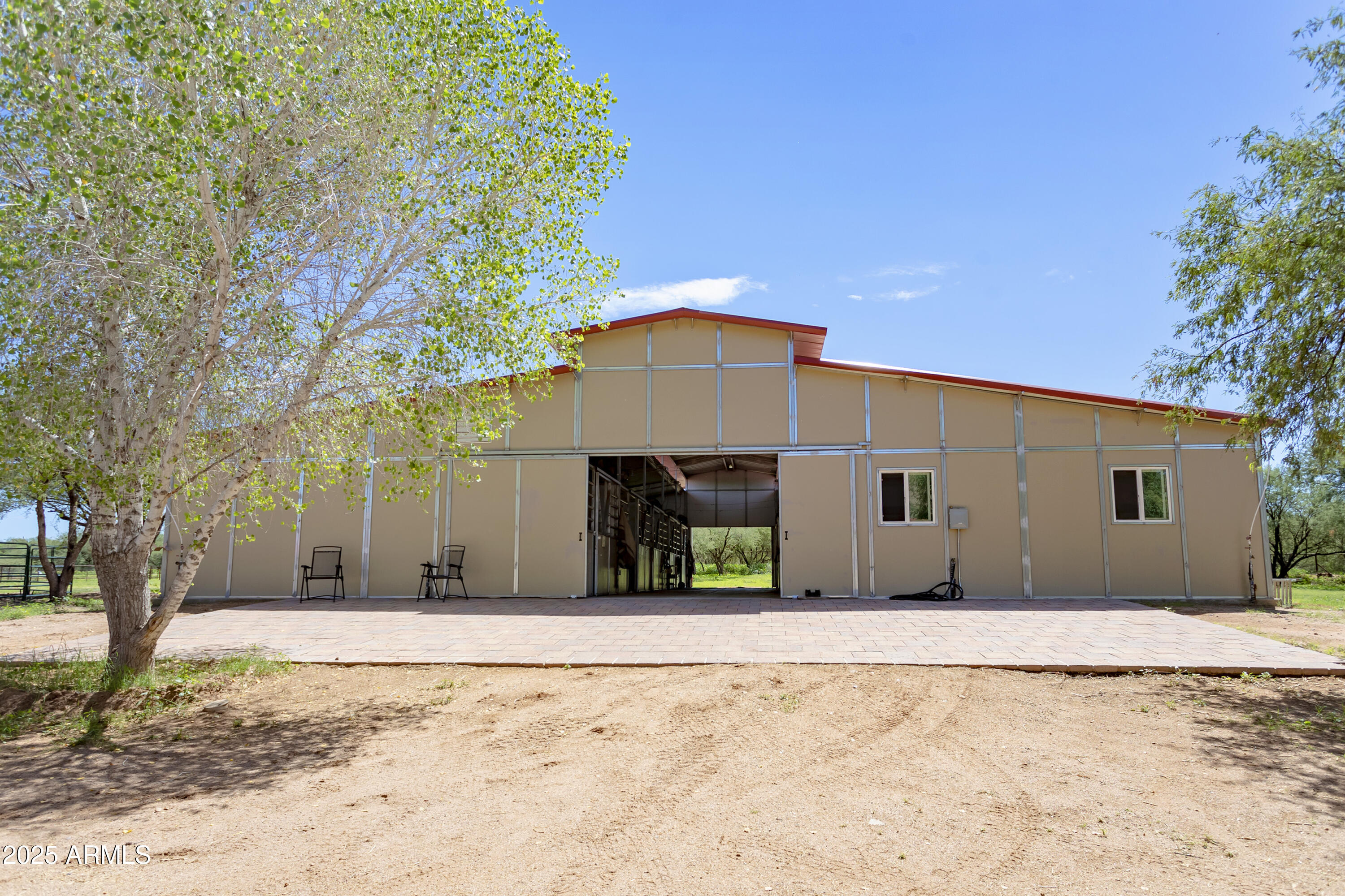 3155 West Elephant Head Road Amado, AZ 85645 - Photo 12 of 79 a front view of a house with a yard