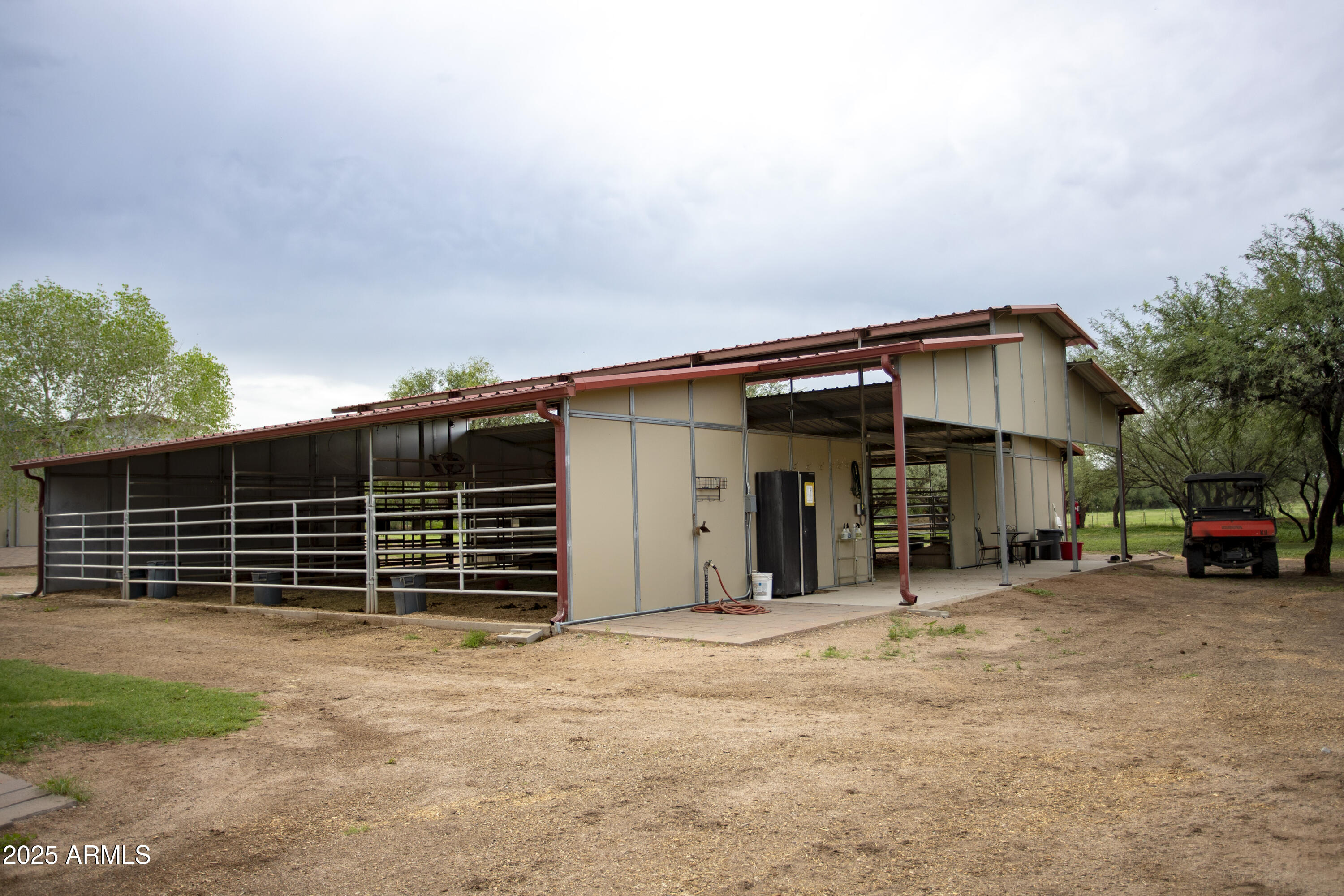 3155 West Elephant Head Road Amado, AZ 85645 - Photo 47 of 79 a view of a house with a yard and garage