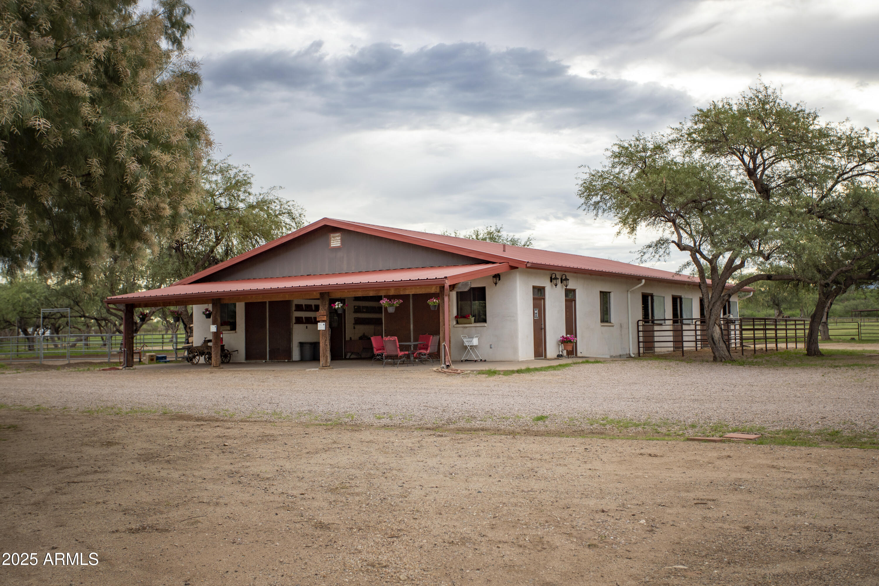 3155 West Elephant Head Road Amado, AZ 85645 - Photo 49 of 79 a front view of a house with a garden