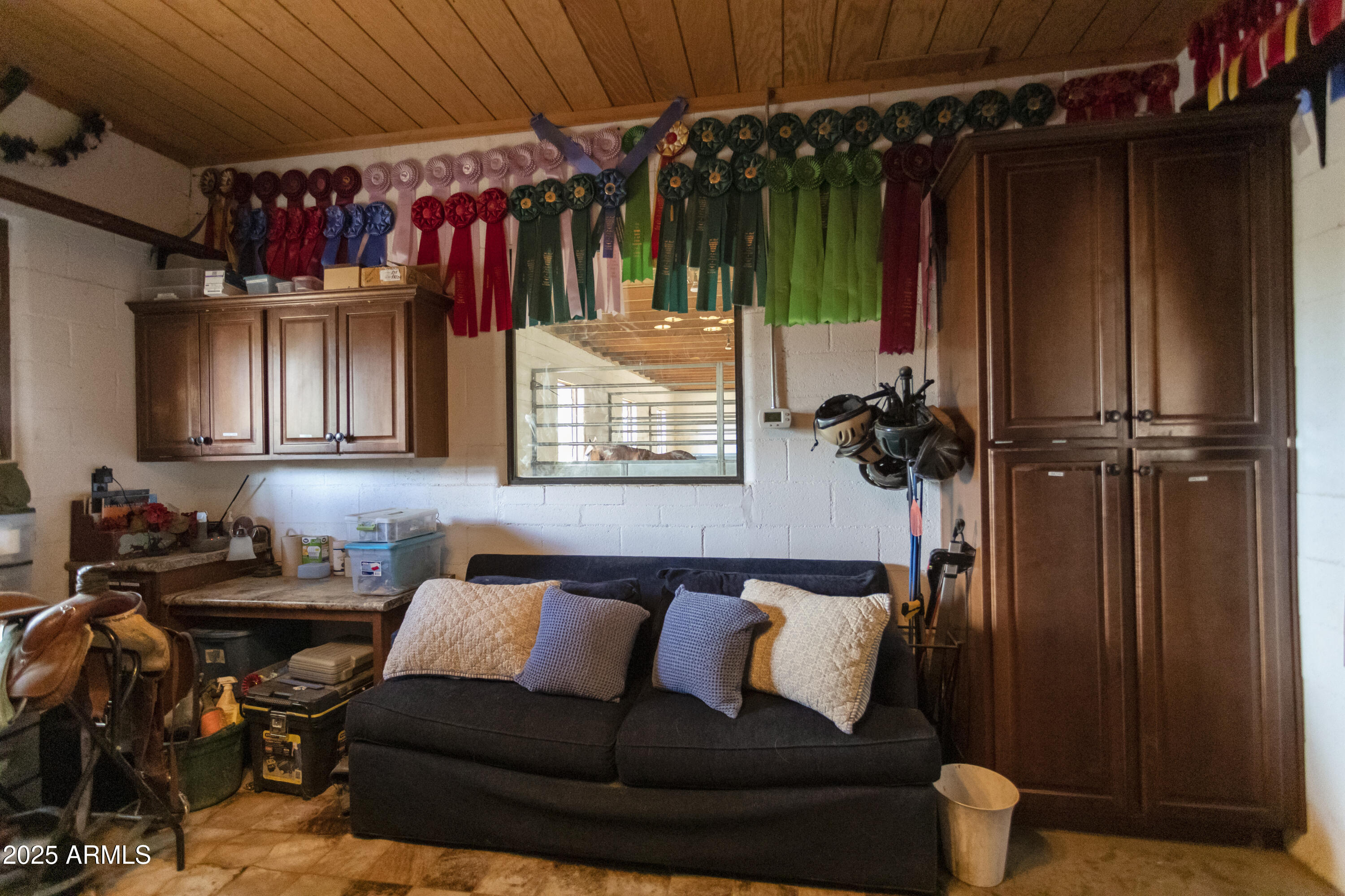 3155 West Elephant Head Road Amado, AZ 85645 - Photo 55 of 79 a view of walk in closet with clothes and shoes