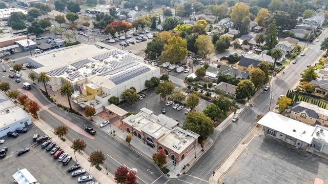 an aerial view of a house with a garden