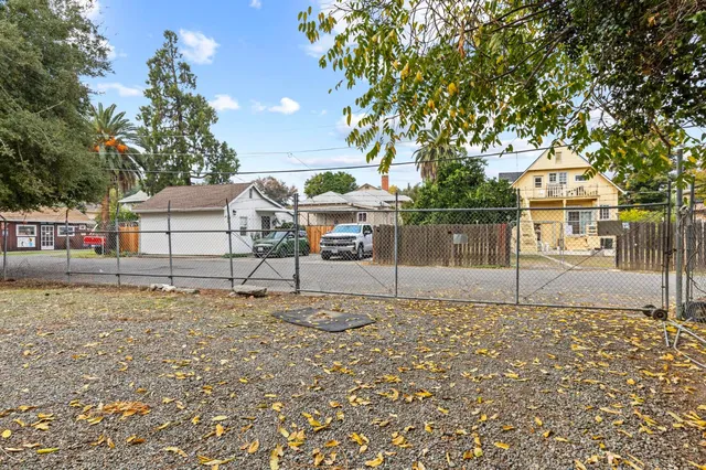 a backyard of a house with lots of green space