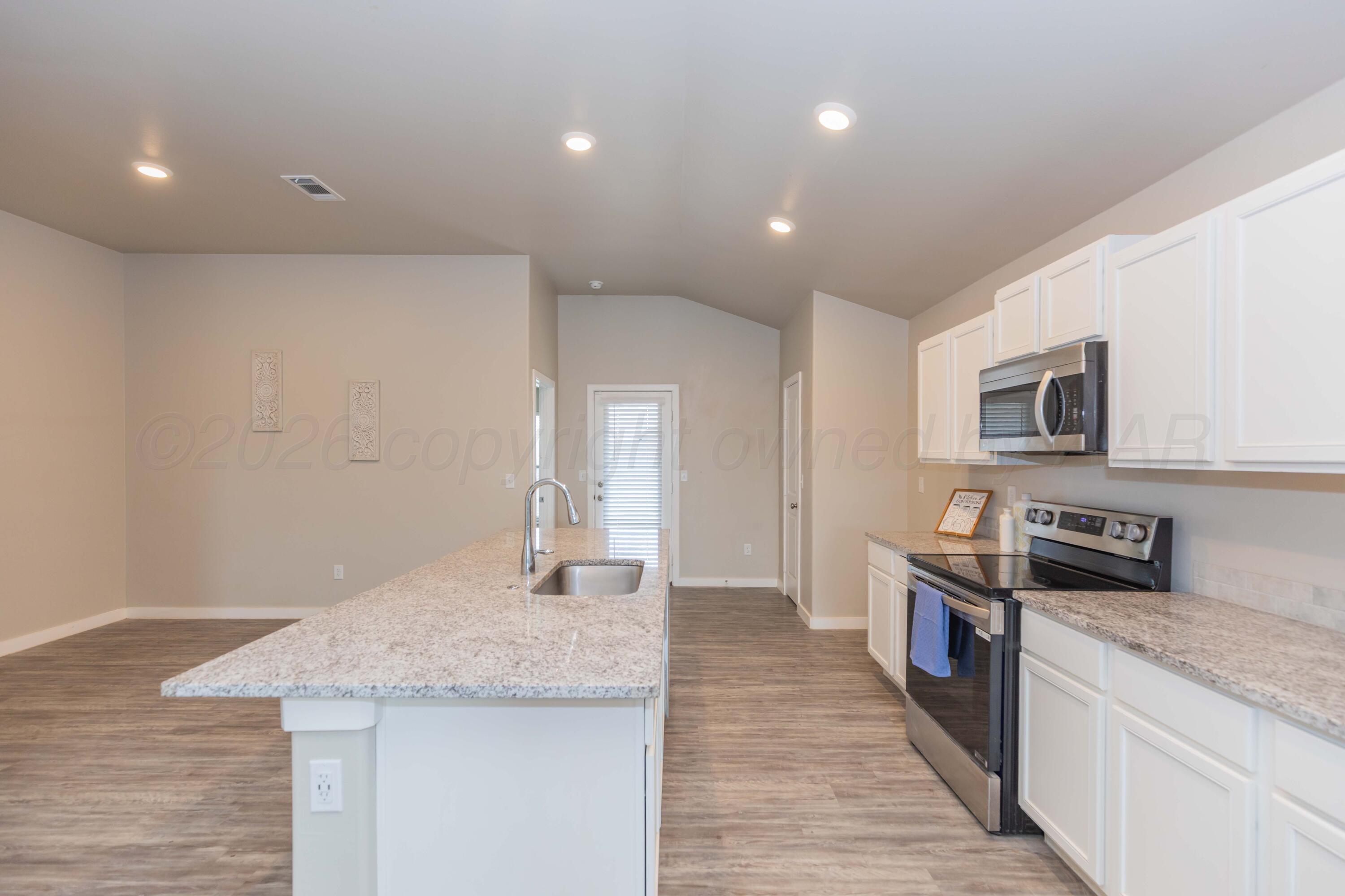 7000 Athens Street Amarillo, TX 79118 - Photo 10 of 42 KITCHEN VIEW 1