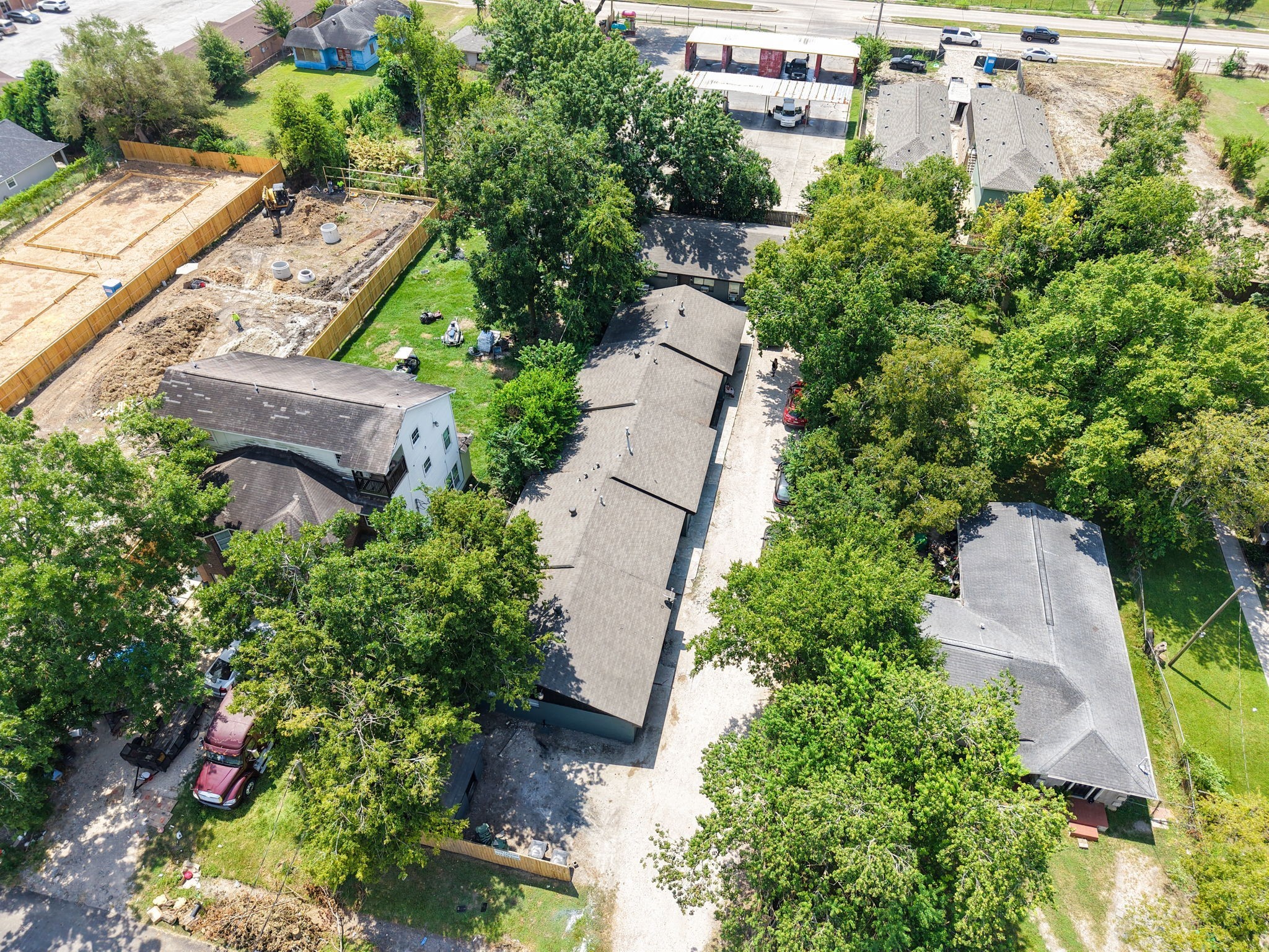 5022 Mallow Street, Unit 7 Houston, TX 77033 - Photo 16 of 20 an aerial view of a house with garden space and street view