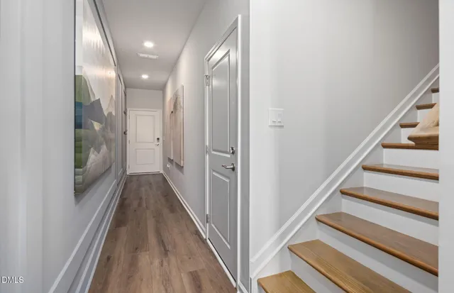 a bathroom with a toilet sink and shower