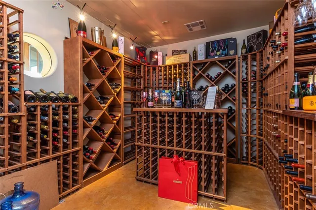a bathroom with a sink a mirror and a shower