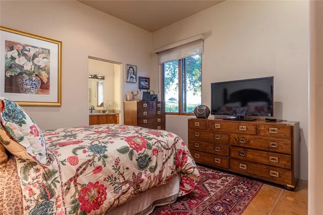 a view of a chairs and table in a patio