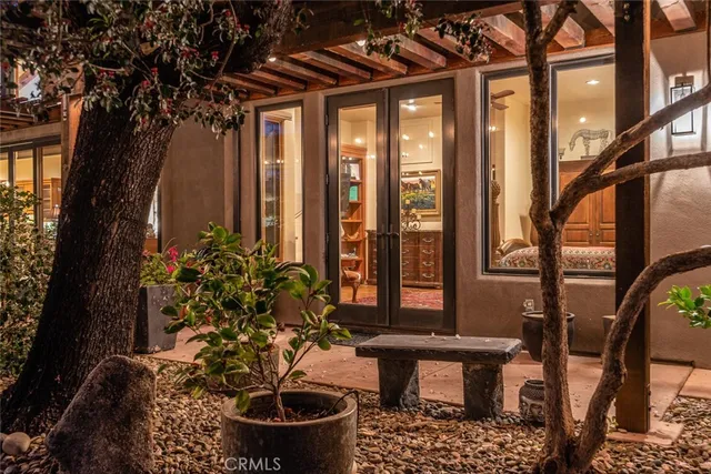 an aerial view of a house with big yard