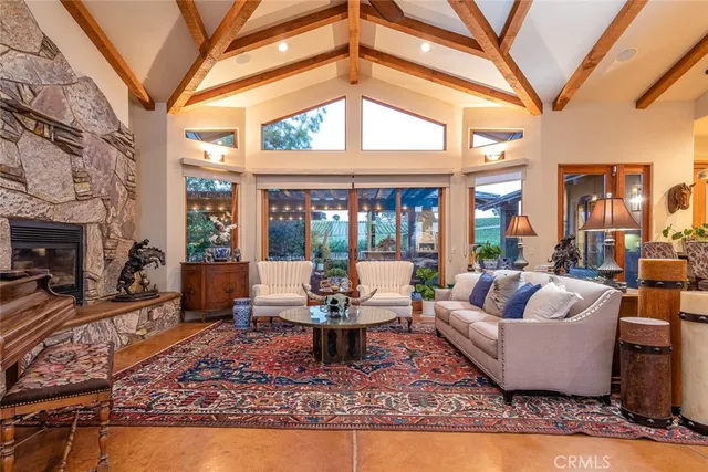 a kitchen with stainless steel appliances granite countertop a stove and more cabinets