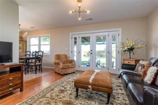an aerial view of a house with a lake view