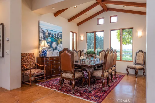 a kitchen with stainless steel appliances granite countertop a sink and a stove