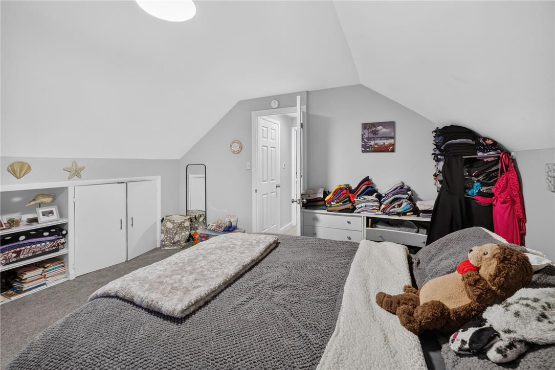3123 Orefield Road Allentown, PA 18104 - Photo 35 of 39 Sloped ceilings and built-in storage define this comfortable bedroom space.