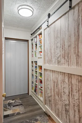 a bathroom with a toilet a sink and a mirror