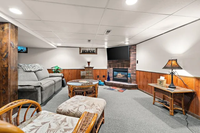 a view of a patio with table and chairs and potted plants