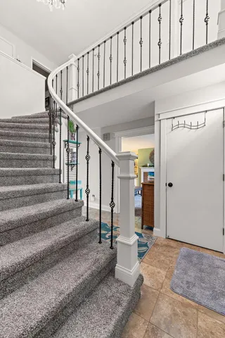 a living room with furniture flat screen tv and a fireplace