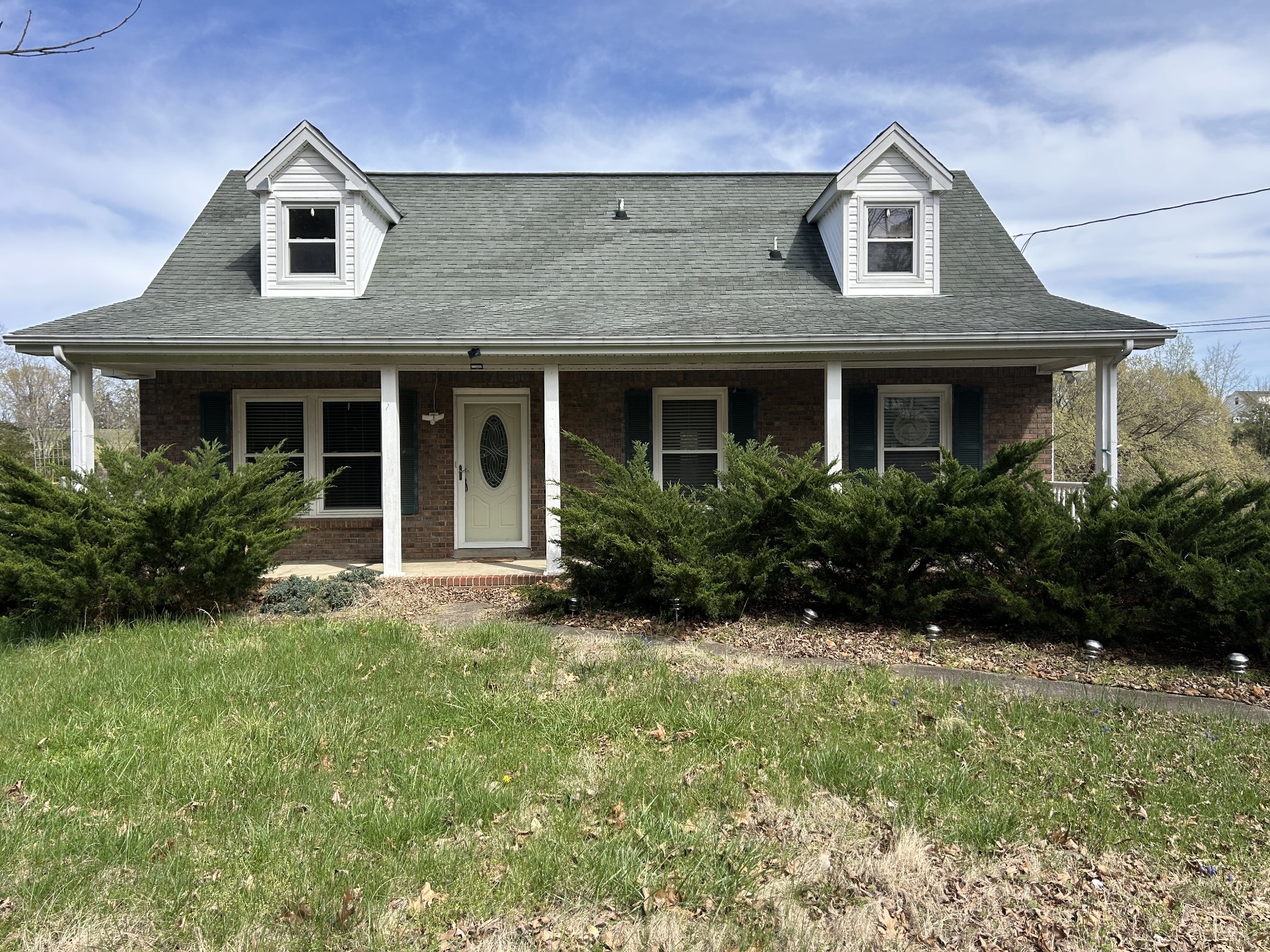 2319 7 Mile Ferry Road Clarksville, TN 37040 - Photo 1 of 15 a front view of a house with a yard