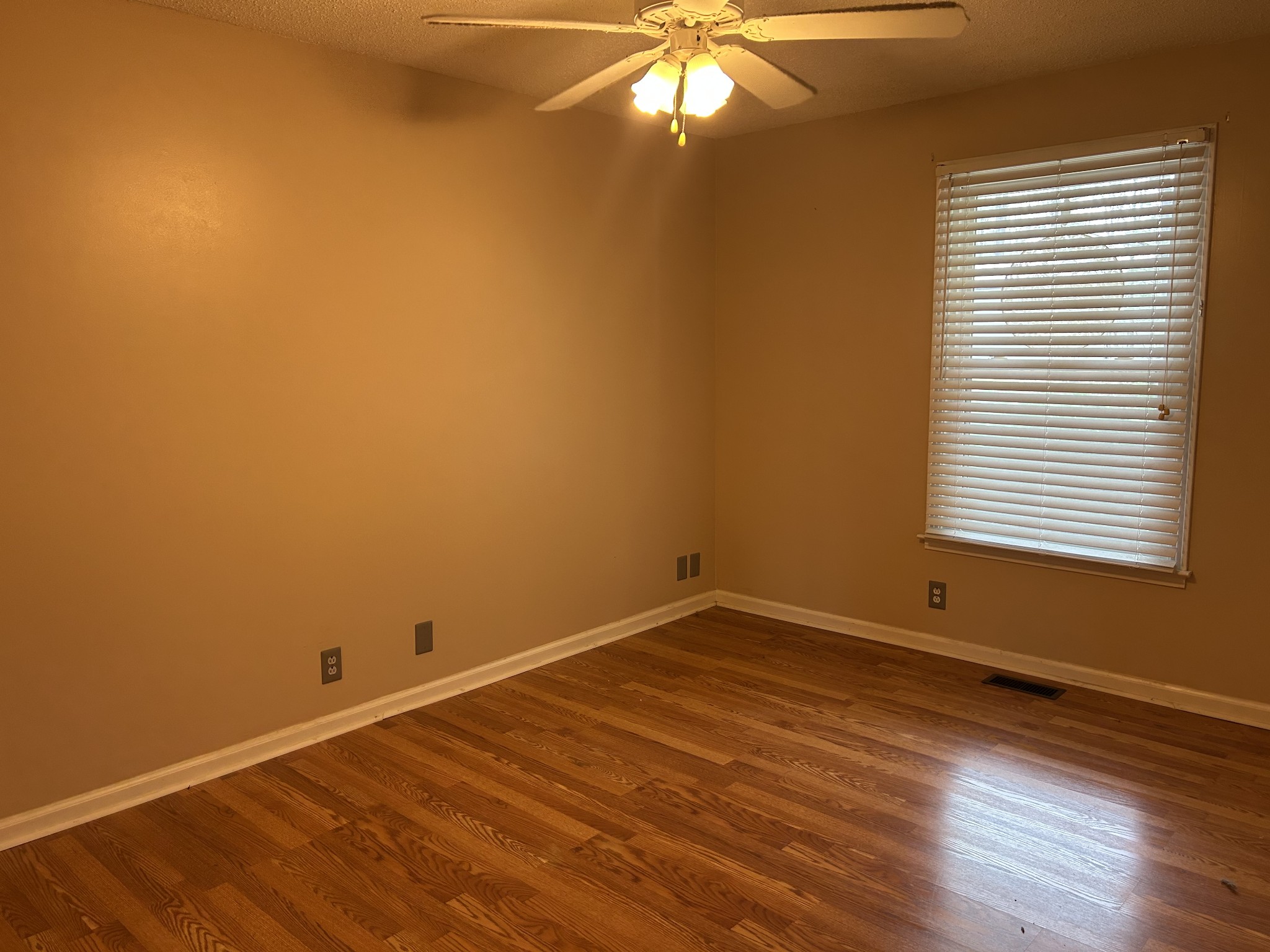 2319 7 Mile Ferry Road Clarksville, TN 37040 - Photo 9 of 15 a view of a room with wooden floor and a window