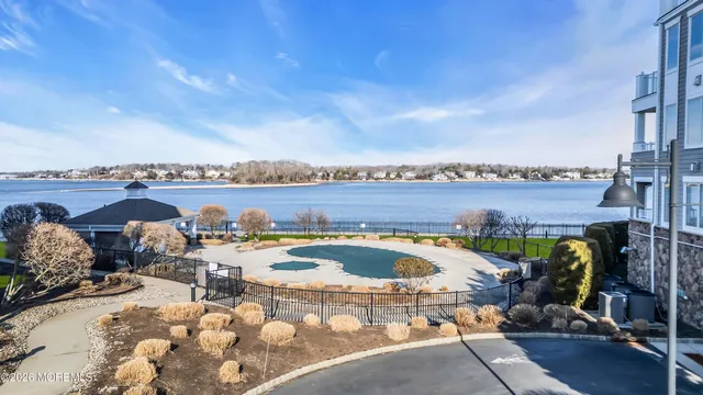 a view of a city with lawn chairs