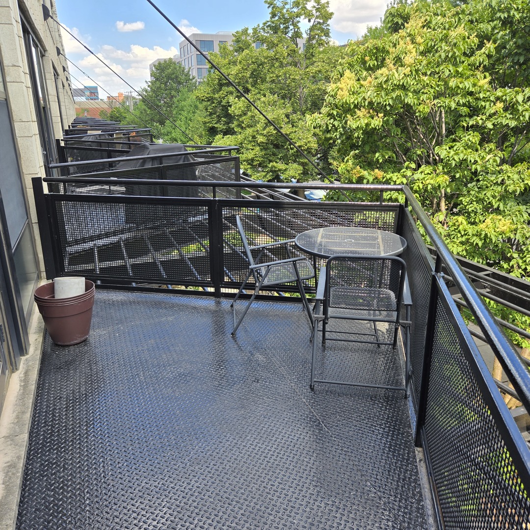 1111 West 15th Street, Unit 228 Chicago, IL 60608 - Photo 23 of 32 a view of outdoor space with seating