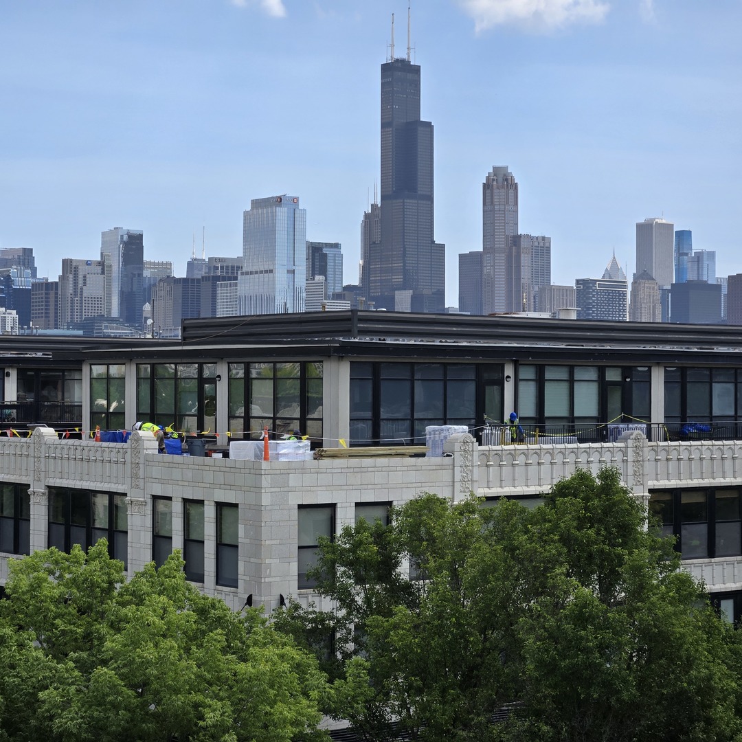 1111 West 15th Street, Unit 228 Chicago, IL 60608 - Photo 27 of 32 a view of a city with tall buildings
